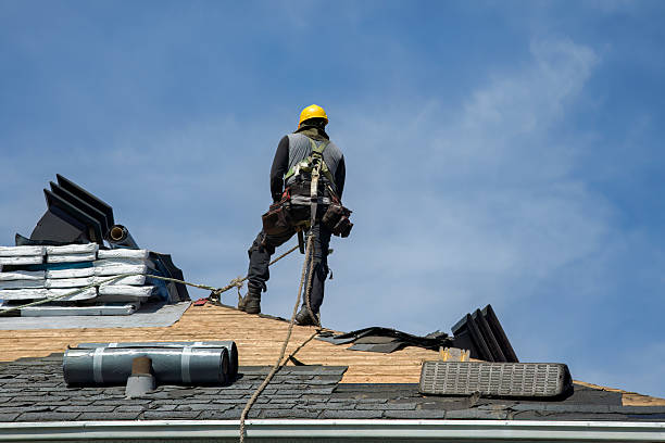 Professional Roofing technician working in Austin, CO